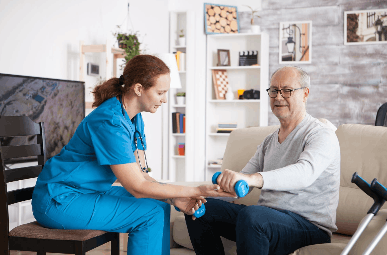 physiotherapist guiding an elderly on light exercise