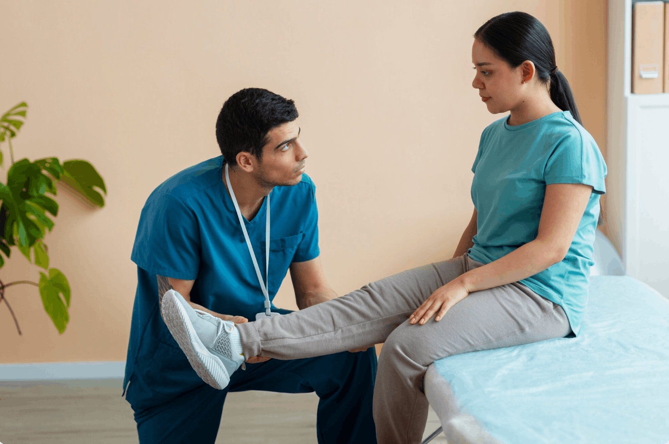physiotherapist examining a patient's joint